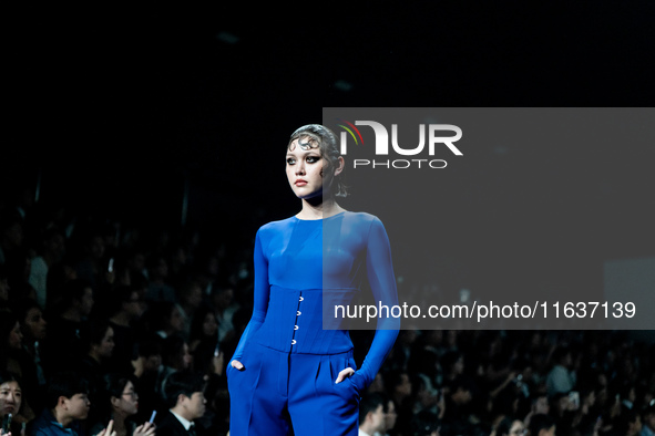 Models showcase creations by POEM on the runway during Day 3 of Bangkok International Fashion Week at Siam Paragon in Bangkok, Thailand, on...