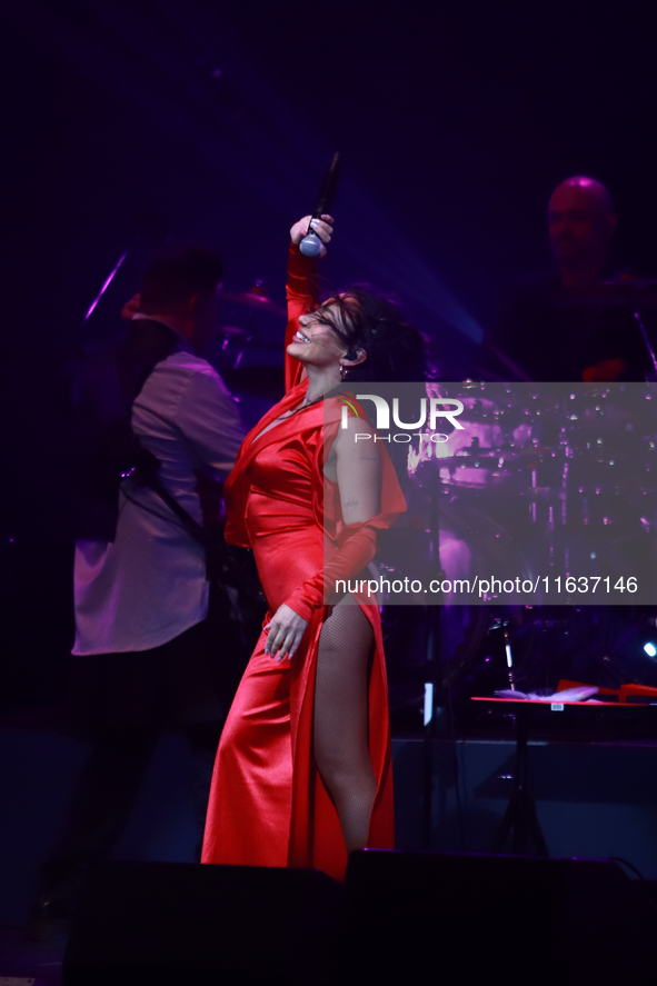 Jass Reyes, singer of the Mexican pop band Playa Limbo, performs on stage as part of their tour to promote the new album ''Hora Cero'' at th...