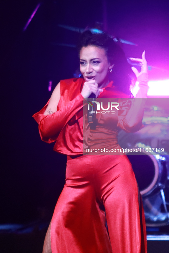 Jass Reyes, singer of the Mexican pop band Playa Limbo, performs on stage as part of their tour to promote the new album ''Hora Cero'' at th...