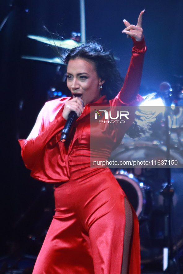 Jass Reyes, singer of the Mexican pop band Playa Limbo, performs on stage as part of their tour to promote the new album ''Hora Cero'' at th...