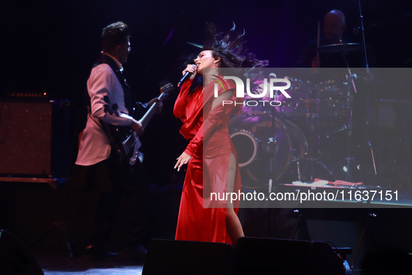 Jass Reyes, singer of the Mexican pop band Playa Limbo, performs on stage as part of their tour to promote the new album ''Hora Cero'' at th...