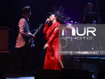 Jass Reyes, singer of the Mexican pop band Playa Limbo, performs on stage as part of their tour to promote the new album ''Hora Cero'' at th...