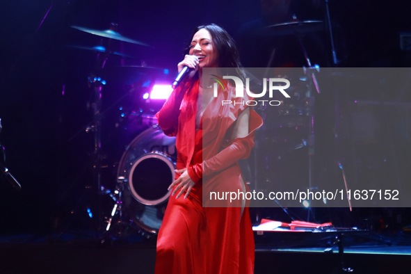 Jass Reyes, singer of the Mexican pop band Playa Limbo, performs on stage as part of their tour to promote the new album ''Hora Cero'' at th...