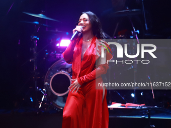 Jass Reyes, singer of the Mexican pop band Playa Limbo, performs on stage as part of their tour to promote the new album ''Hora Cero'' at th...