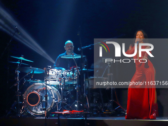 Jass Reyes, singer of the Mexican pop band Playa Limbo, performs on stage as part of their tour to promote the new album ''Hora Cero'' at th...