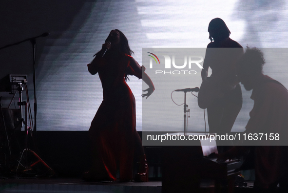 Jass Reyes, singer of the Mexican pop band Playa Limbo, performs on stage as part of their tour to promote the new album ''Hora Cero'' at th...