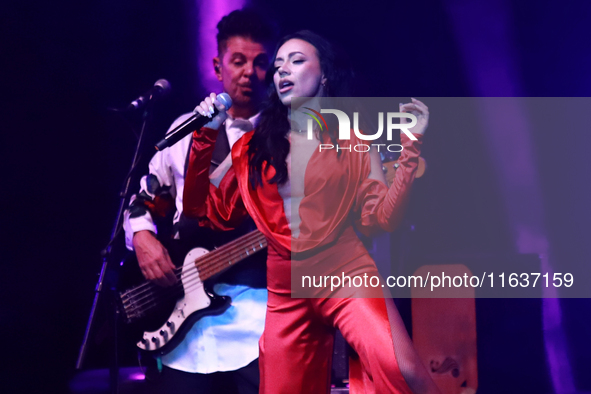 Jass Reyes, singer of the Mexican pop band Playa Limbo, performs on stage as part of their tour to promote the new album ''Hora Cero'' at th...