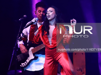 Jass Reyes, singer of the Mexican pop band Playa Limbo, performs on stage as part of their tour to promote the new album ''Hora Cero'' at th...