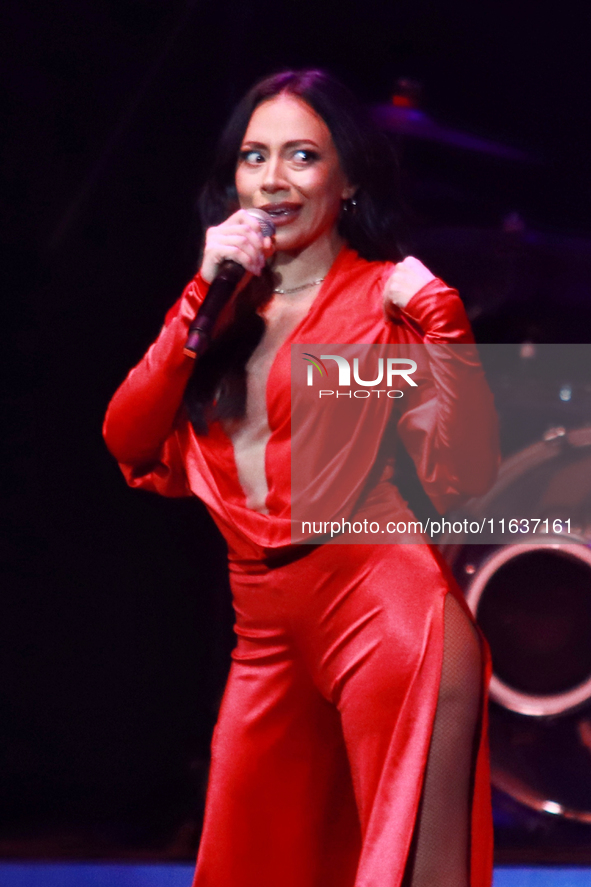 Jass Reyes, singer of the Mexican pop band Playa Limbo, performs on stage as part of their tour to promote the new album ''Hora Cero'' at th...