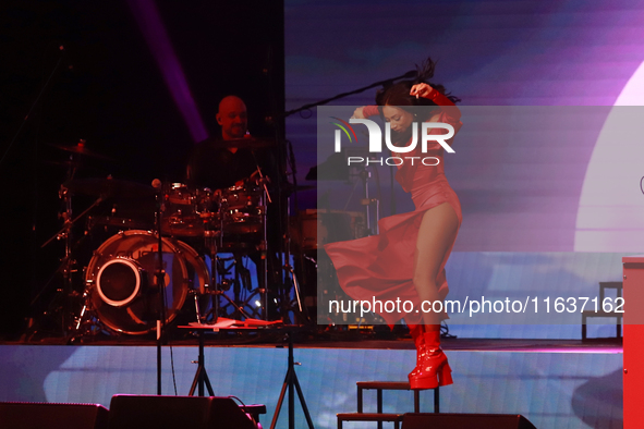 Jass Reyes, singer of the Mexican pop band Playa Limbo, performs on stage as part of their tour to promote the new album ''Hora Cero'' at th...