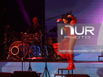 Jass Reyes, singer of the Mexican pop band Playa Limbo, performs on stage as part of their tour to promote the new album ''Hora Cero'' at th...