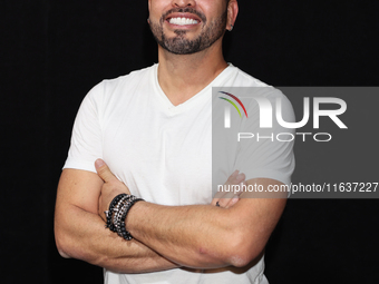 Omar Suarez poses for photos during the 'El Sotano' press conference at Teatro Fernando Soler in Mexico City, Mexico, on October 4, 2024. (