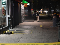 New York City Police Department crime scene investigators mark evidence discovered at the scene where former Governor of New York David Pate...