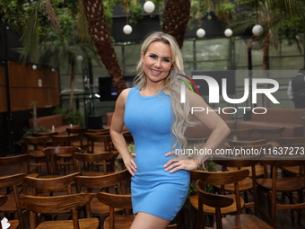 Michelle Vieth poses for photos during the 'Podcast Linea Morada' press conference at Terraza Bichicori in Mexico City, Mexico, on October 4...