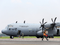 The crew exits the aircraft during the TNI Transport Aircraft Static Show event to commemorate the 79th Anniversary of the TNI at Husein Sas...