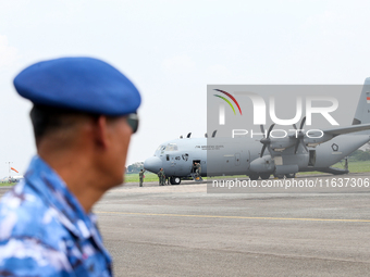 The crew exits the aircraft during the TNI Transport Aircraft Static Show event to commemorate the 79th Anniversary of the TNI at Husein Sas...