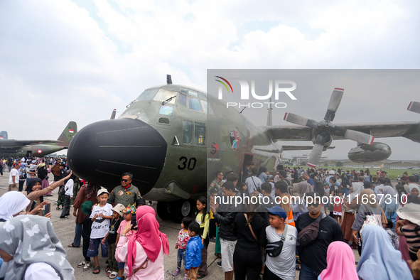 Thousands of residents see parked aircraft during the TNI Transport Aircraft Static Show event to commemorate the 79th Anniversary of the TN...