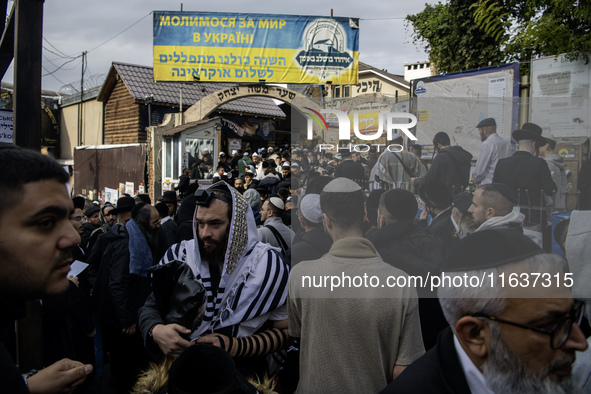 Orthodox Jewish pilgrims pray near the tomb of Rabbi Nachman while celebrating Rosh Hashanah, the Jewish New Year, as Russia continues the w...