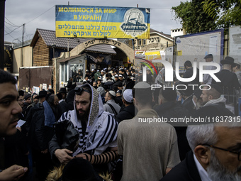 Orthodox Jewish pilgrims pray near the tomb of Rabbi Nachman while celebrating Rosh Hashanah, the Jewish New Year, as Russia continues the w...