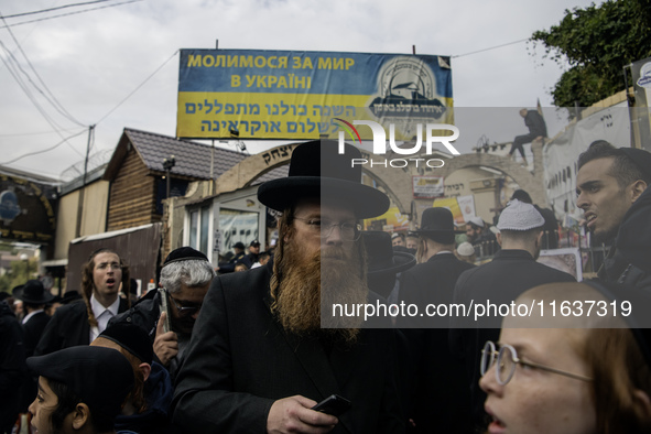 Orthodox Jewish pilgrims pray near the tomb of Rabbi Nachman while celebrating Rosh Hashanah, the Jewish New Year, as Russia continues the w...