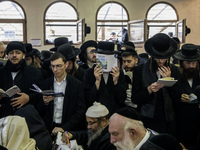 Orthodox Jewish pilgrims pray near the tomb of Rabbi Nachman while celebrating Rosh Hashanah, the Jewish New Year, as Russia continues the w...