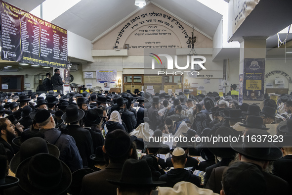 Orthodox Jewish pilgrims pray near the tomb of Rabbi Nachman while celebrating Rosh Hashanah, the Jewish New Year, as Russia continues the w...