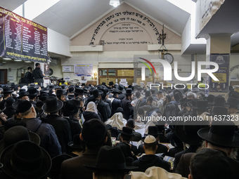 Orthodox Jewish pilgrims pray near the tomb of Rabbi Nachman while celebrating Rosh Hashanah, the Jewish New Year, as Russia continues the w...