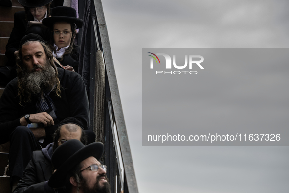 Orthodox Jewish pilgrims pray near the tomb of Rabbi Nachman while celebrating Rosh Hashanah, the Jewish New Year, as Russia continues the w...