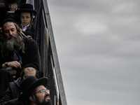 Orthodox Jewish pilgrims pray near the tomb of Rabbi Nachman while celebrating Rosh Hashanah, the Jewish New Year, as Russia continues the w...