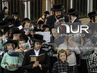 Children Orthodox Jewish pilgrims pray near the tomb of Rabbi Nachman while celebrating Rosh Hashanah, the Jewish New Year, amid the ongoing...