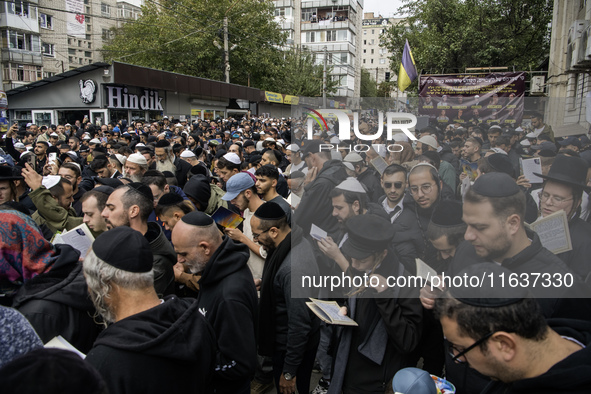 Orthodox Jewish pilgrims pray near the tomb of Rabbi Nachman while celebrating Rosh Hashanah, the Jewish New Year, as Russia continues the w...