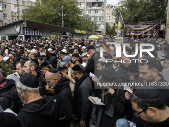 Orthodox Jewish pilgrims pray near the tomb of Rabbi Nachman while celebrating Rosh Hashanah, the Jewish New Year, as Russia continues the w...