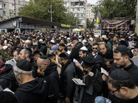 Orthodox Jewish pilgrims pray near the tomb of Rabbi Nachman while celebrating Rosh Hashanah, the Jewish New Year, as Russia continues the w...