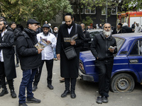 Orthodox Jewish pilgrims pray near the tomb of Rabbi Nachman while celebrating Rosh Hashanah, the Jewish New Year, as Russia continues the w...