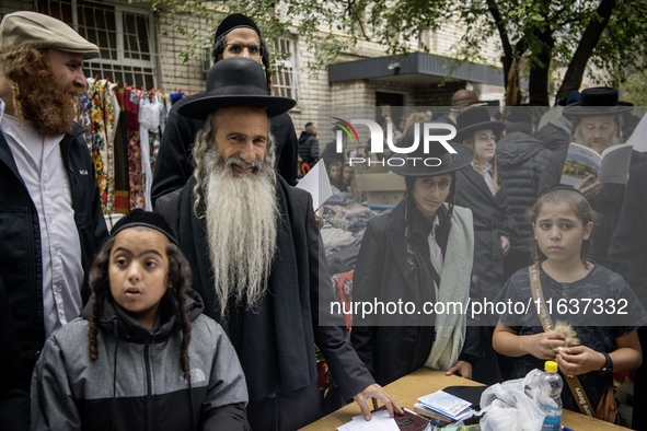 Orthodox Jewish pilgrims gather near the tomb of Rabbi Nachman to celebrate Rosh Hashanah, the Jewish New Year, while Russia continues the w...