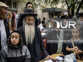 Orthodox Jewish pilgrims gather near the tomb of Rabbi Nachman to celebrate Rosh Hashanah, the Jewish New Year, while Russia continues the w...