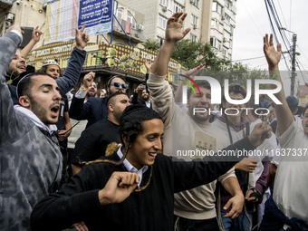 Orthodox Jewish pilgrims dance outside the tomb of Rabbi Nachman while celebrating Rosh Hashanah, the Jewish New Year, as Russia continues t...