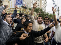 Orthodox Jewish pilgrims dance outside the tomb of Rabbi Nachman while celebrating Rosh Hashanah, the Jewish New Year, as Russia continues t...