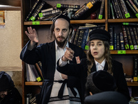 Orthodox Jewish pilgrims pray near the tomb of Rabbi Nachman while celebrating Rosh Hashanah, the Jewish New Year, as Russia continues the w...