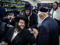 Orthodox Jewish pilgrims pray near the tomb of Rabbi Nachman while celebrating Rosh Hashanah, the Jewish New Year, as Russia continues the w...