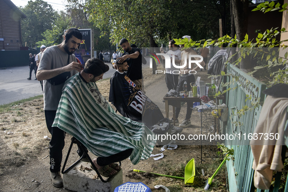 Ultra-Orthodox Jewish Hasidic pilgrims have haircuts on the eve of the Rosh Hashanah holiday, the Jewish New Year, near the tomb of Rabbi Na...