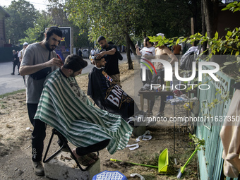 Ultra-Orthodox Jewish Hasidic pilgrims have haircuts on the eve of the Rosh Hashanah holiday, the Jewish New Year, near the tomb of Rabbi Na...