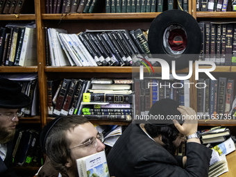 Orthodox Jewish pilgrims pray near the tomb of Rabbi Nachman while celebrating Rosh Hashanah, the Jewish New Year, as Russia continues the w...