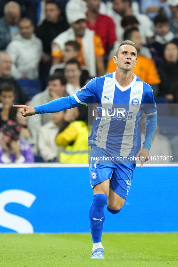 Kike Garcia centre-forward of Alaves and Spain celebrates after scoring his sides first goal during the La Liga match between Real Madrid CF...