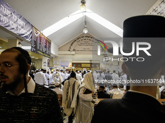 Orthodox Jewish pilgrims pray near the tomb of Rabbi Nachman while celebrating Rosh Hashanah, the Jewish New Year, amid the ongoing war in U...