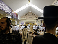 Orthodox Jewish pilgrims pray near the tomb of Rabbi Nachman while celebrating Rosh Hashanah, the Jewish New Year, amid the ongoing war in U...