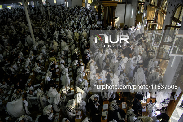 Ultra-Orthodox Jewish Hasidic pilgrims pray in the Synagogue of Bratslav Hasidim near the tomb of Rabbi Nachman on the eve of the Rosh Hasha...