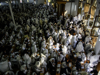 Ultra-Orthodox Jewish Hasidic pilgrims pray in the Synagogue of Bratslav Hasidim near the tomb of Rabbi Nachman on the eve of the Rosh Hasha...