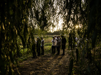 Ultra-Orthodox Jewish pilgrims pray on the bank of a lake near the tomb of Rabbi Nachman while celebrating Rosh Hashanah, the Jewish New Yea...