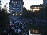 Ultra-Orthodox Jewish pilgrims pray on the bank of a lake near the tomb of Rabbi Nachman while celebrating Rosh Hashanah, the Jewish New Yea...